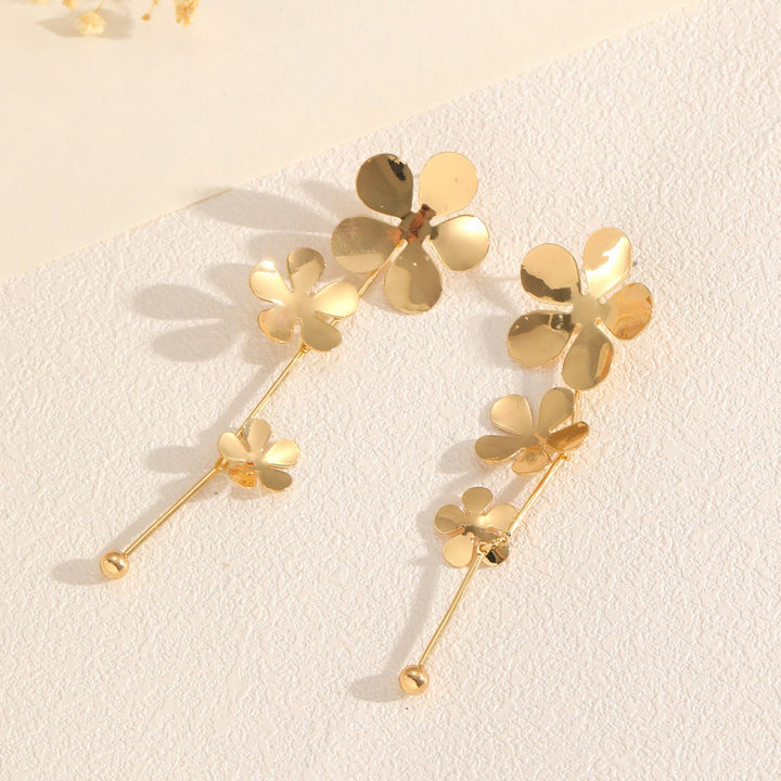 Women’s earrings with floral elements and shiny finish Nin Boutique