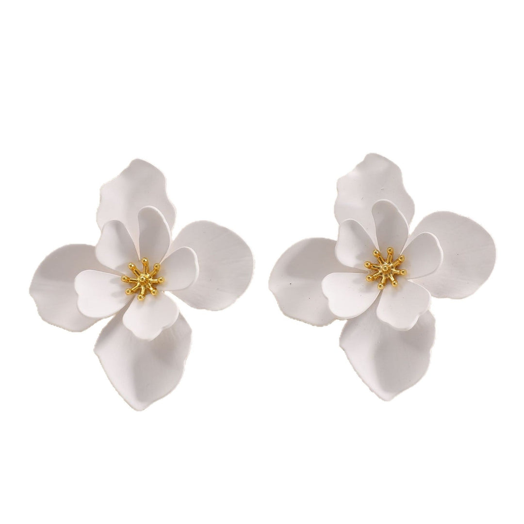 Ladies earrings in artistic floral style with pearl accent Nin Boutique