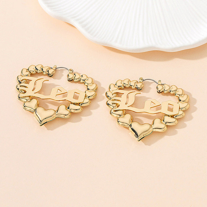 Women’s earrings with unique heart design and astrological element Nin Boutique