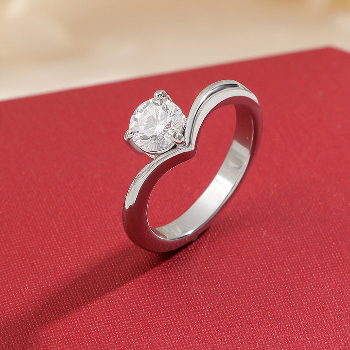 Ladies ring with elegant wave pattern and sparkling zirconia Nin Boutique