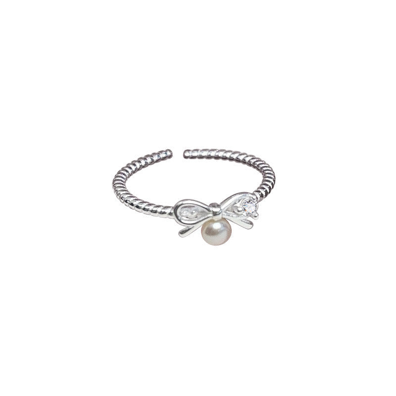 Women's ring with elegant bow and pearl motif Nin Boutique