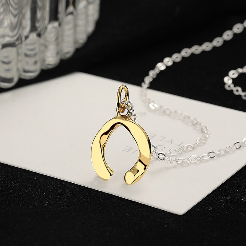 Ladies necklace with filigree lucky charm pendant Nin Boutique