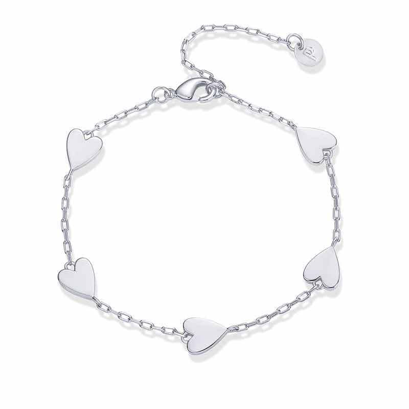 Ladies ankle bracelet with delicate heart pendants and dainty chain design Nin Boutique