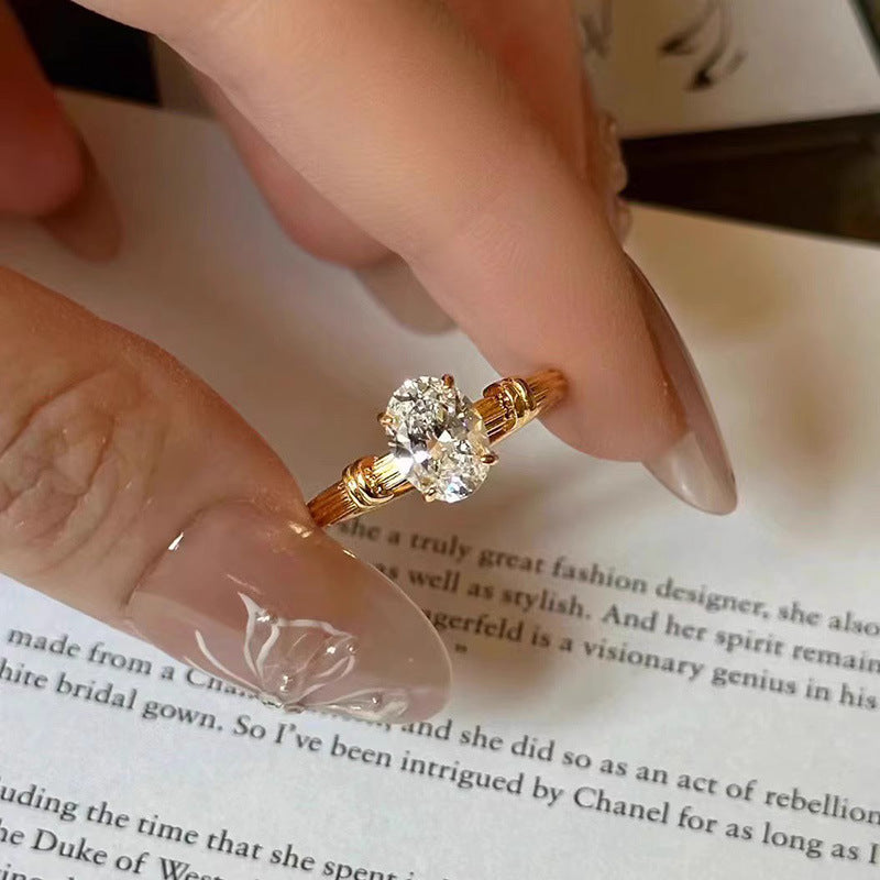 Ladies ring with elaborate oval crystal and elegant wire design Nin Boutique