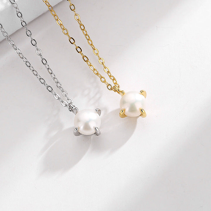 Women's necklace with elegant pearl design and fine gold pendant Nin Boutique