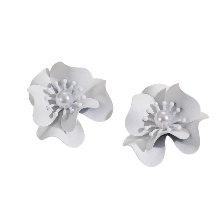 Women's earrings with intricate floral design and pearl accent Nin Boutique