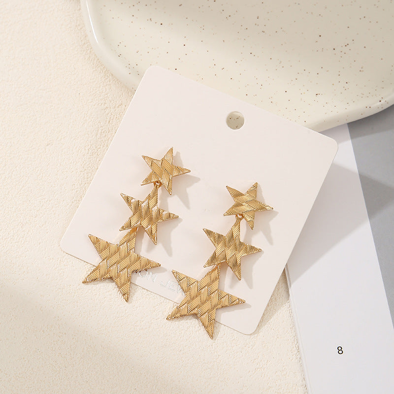 Ladies earrings in modern star design Nin Boutique