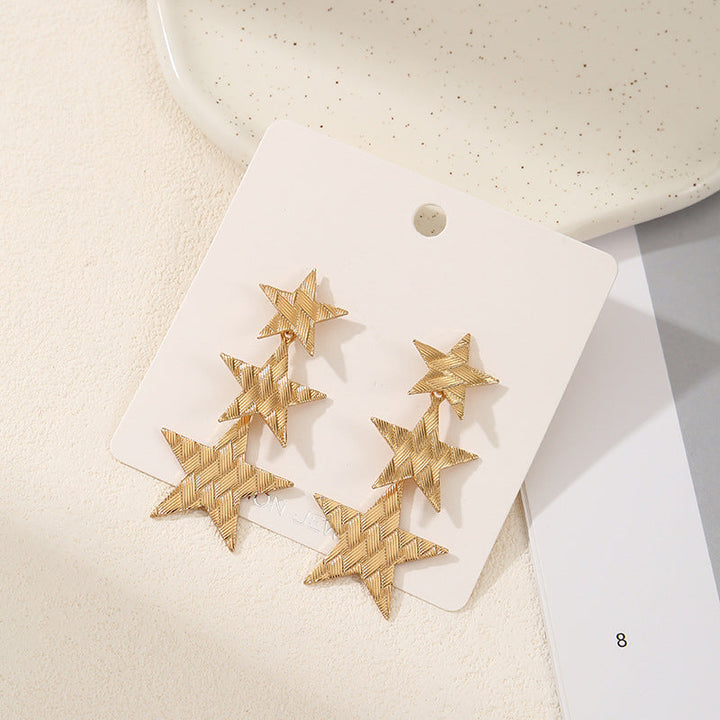 Ladies earrings in modern star design Nin Boutique