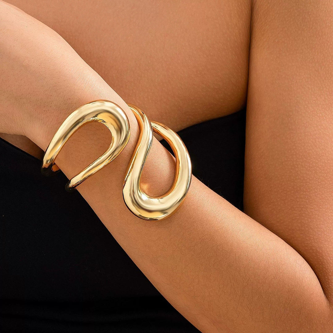 Ladies' bangle with elegant, curved design Nin Boutique