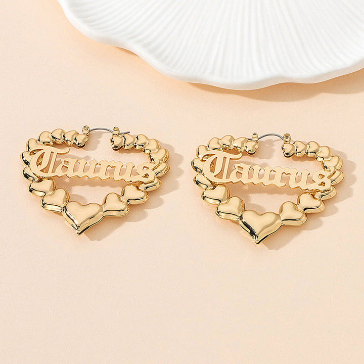 Women’s earrings with unique heart design and astrological element Nin Boutique