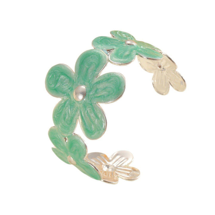 Ladies bracelet made of high-quality metal with floral design Nin Boutique