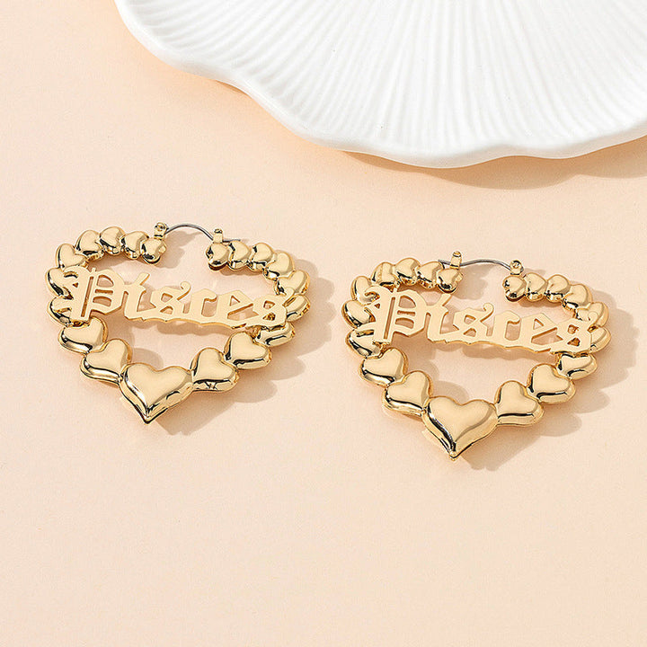 Women’s earrings with unique heart design and astrological element Nin Boutique