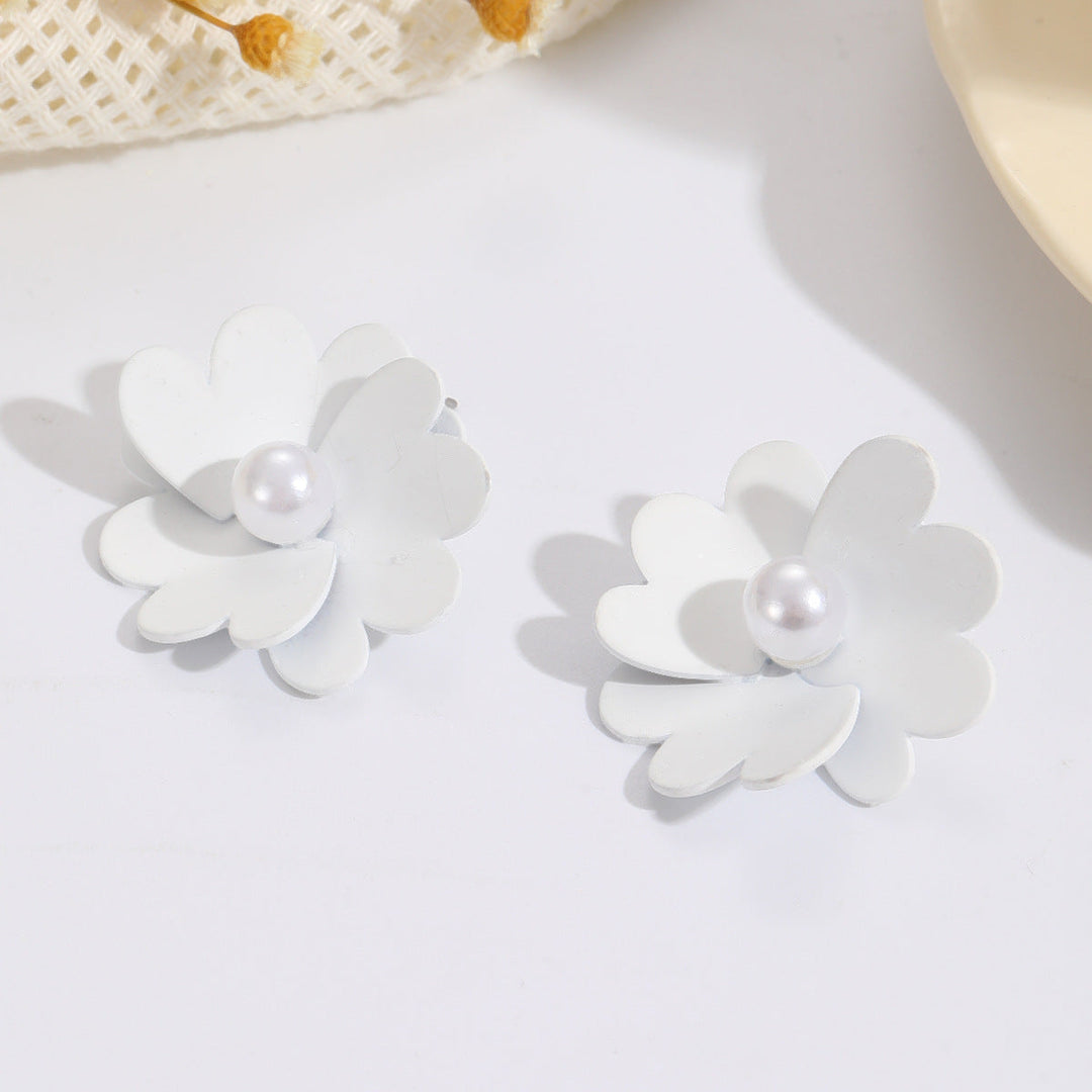Women's earrings with vibrant floral design and stylish pearl accents Nin Boutique