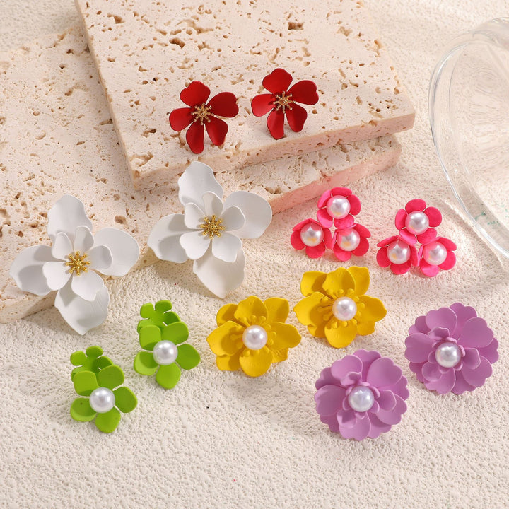 Ladies earrings in artistic floral style with pearl accent Nin Boutique