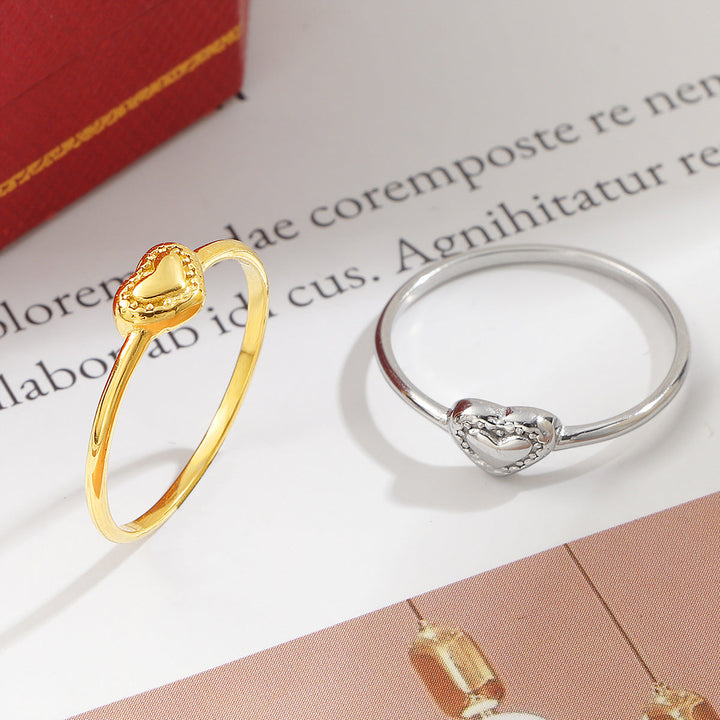 Ladies' delicate ring with heart-shaped design and sparkling accents Nin Boutique