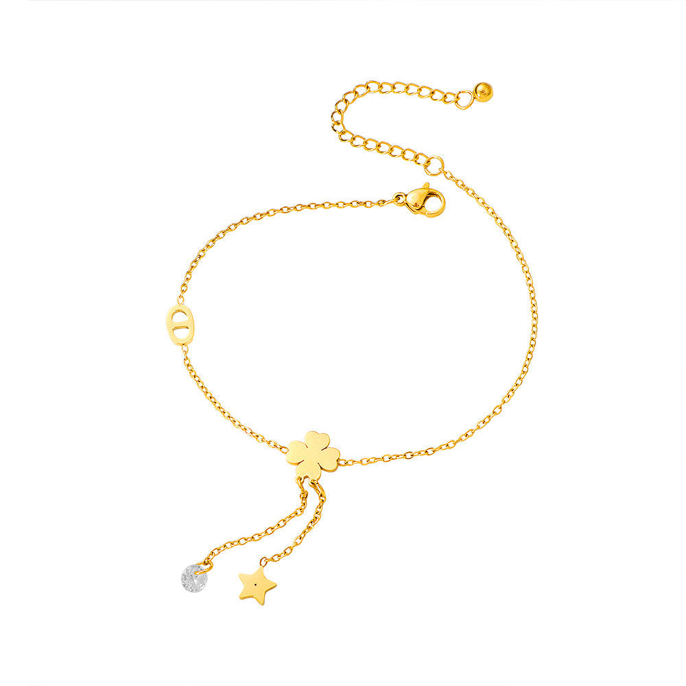Women's ankle bracelet with delicate lucky flower design and sparkling pendant Nin Boutique