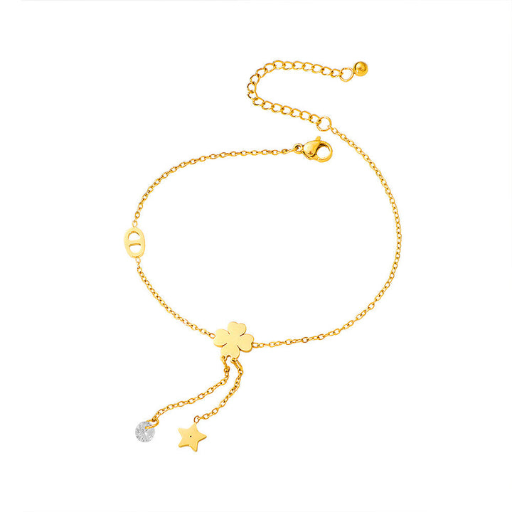 Women's ankle bracelet with delicate lucky flower design and sparkling pendant Nin Boutique