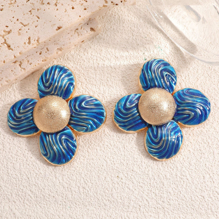 Ladies earrings in elaborate flower pattern Nin Boutique