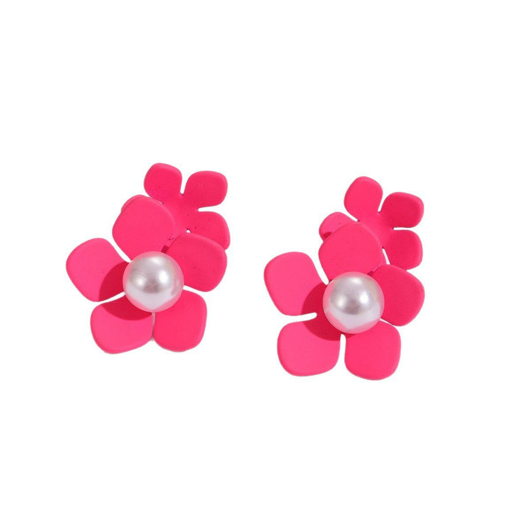 Women’s earrings with artistic floral motif and pearl accent Nin Boutique