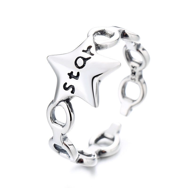 Women's ring with modern star design and engraved lettering Nin Boutique