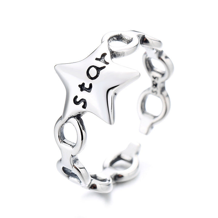 Women's ring with modern star design and engraved lettering Nin Boutique