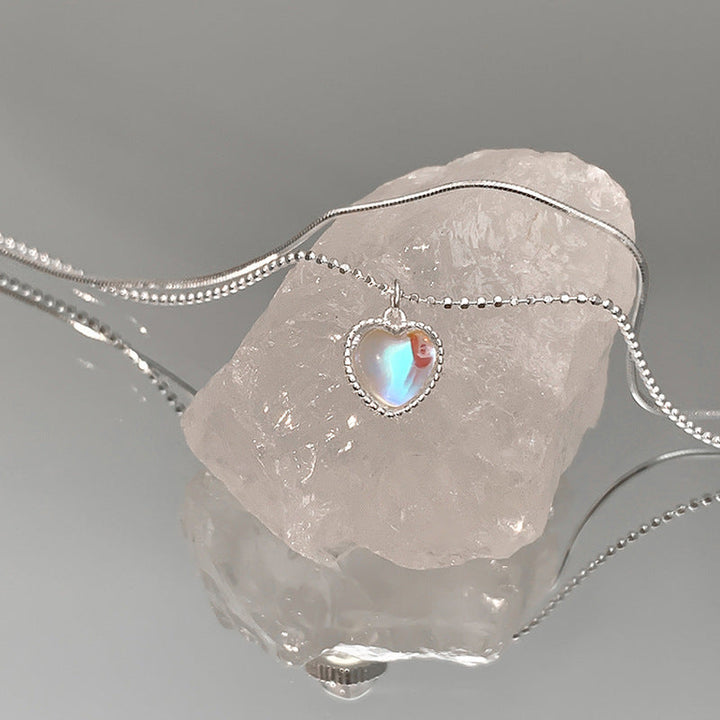 Women's necklace with playful heart pendant and floral detail Nin Boutique