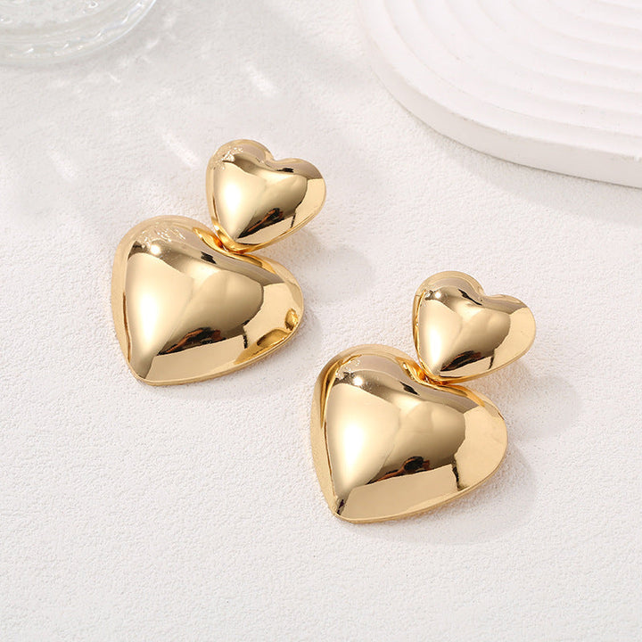 Women's stud earrings in elegant, structured gold design Nin Boutique