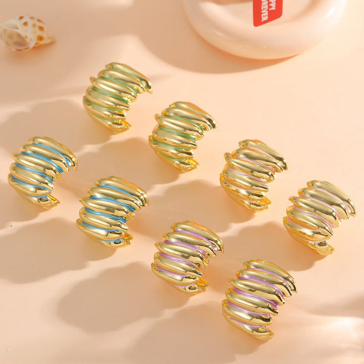 Ladies' jewelry earrings in elegant wave pattern Nin Boutique