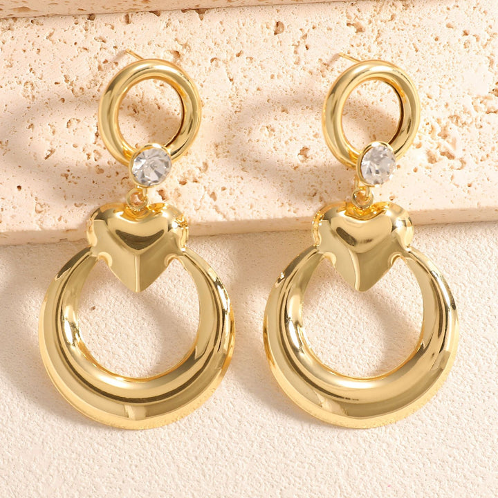 Ladies earrings with modern heart and ring design Nin Boutique
