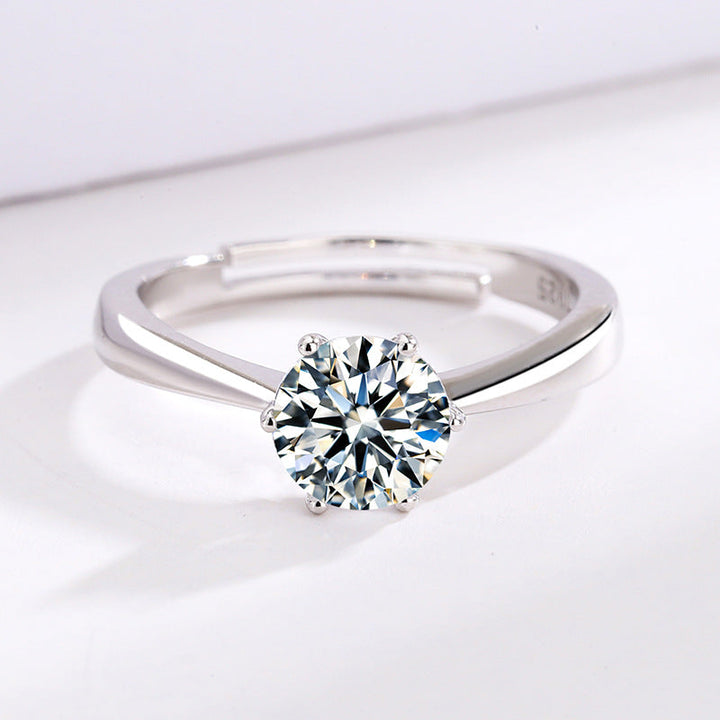 Women's ring with sparkling zircon and modern, curved design Nin Boutique