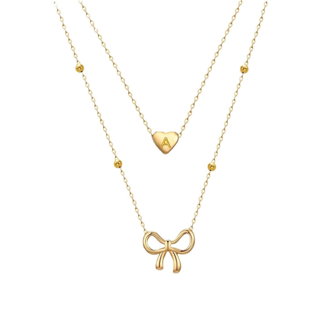 Women’s necklace with double layered design and charming pendants Nin Boutique