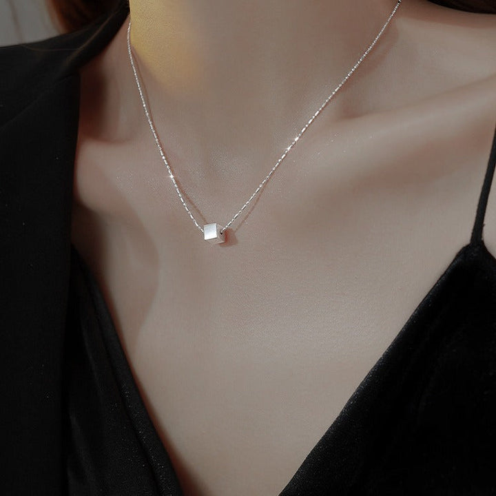 Women's necklace with modern, geometric cube pendant Nin Boutique