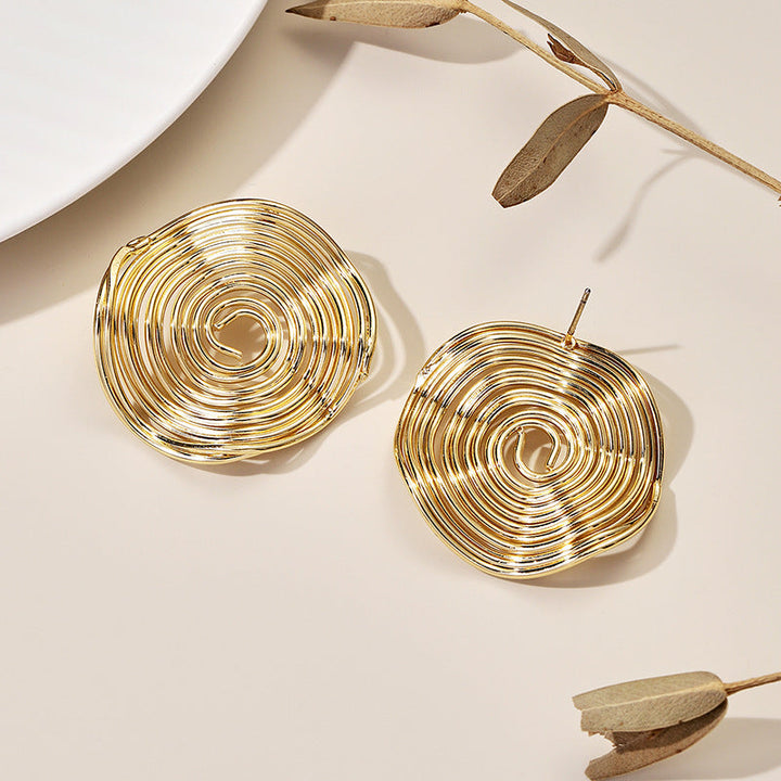 Ladies earrings with spiral design Nin Boutique