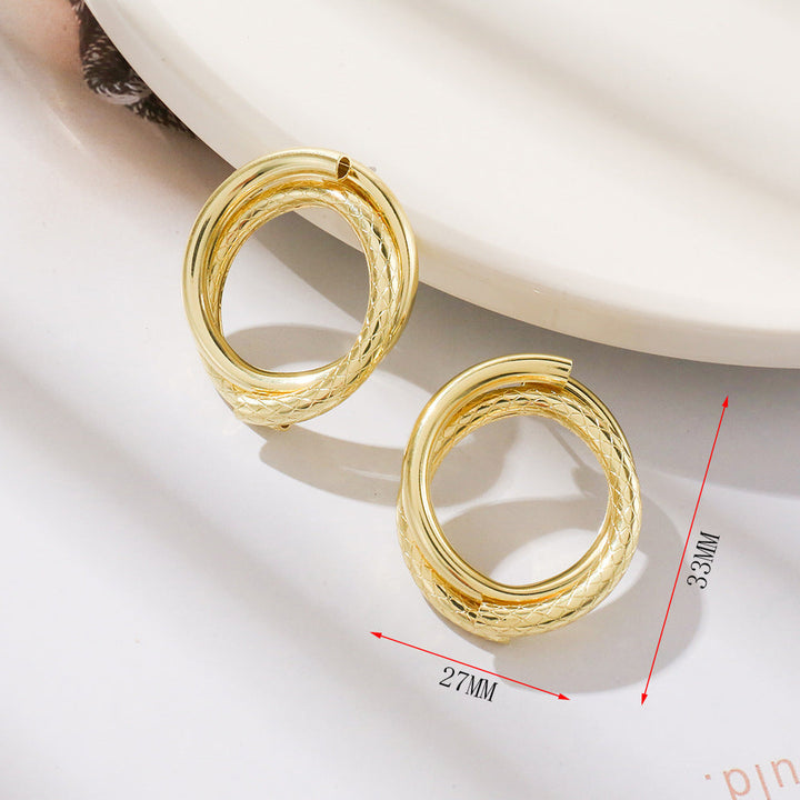 Women’s earrings with intricate braided design Nin Boutique