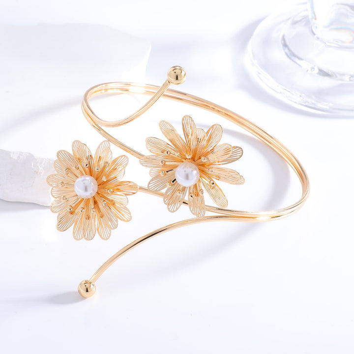 Ladies elegant arm jewelry with floral motifs Nin Boutique