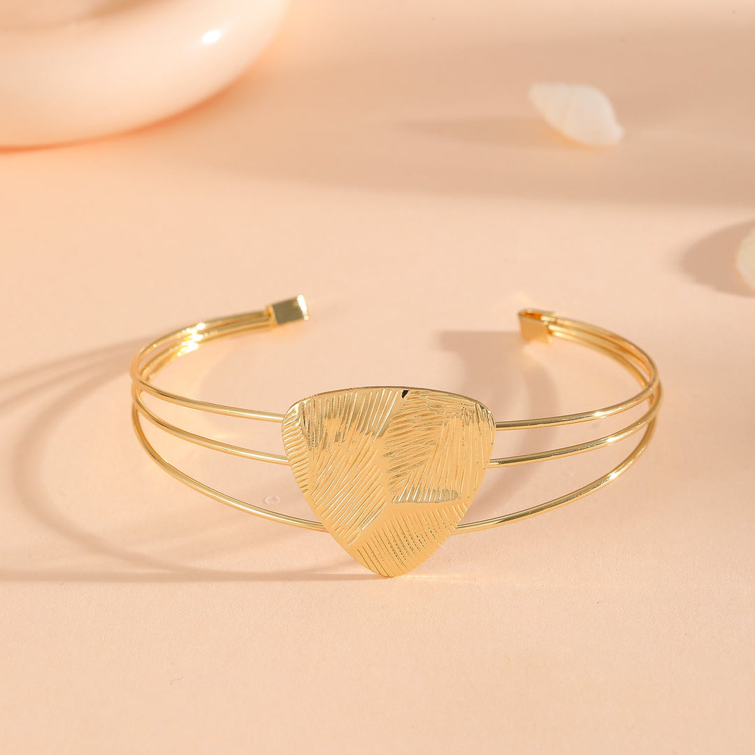 Women's bangle with elaborate bow design Nin Boutique