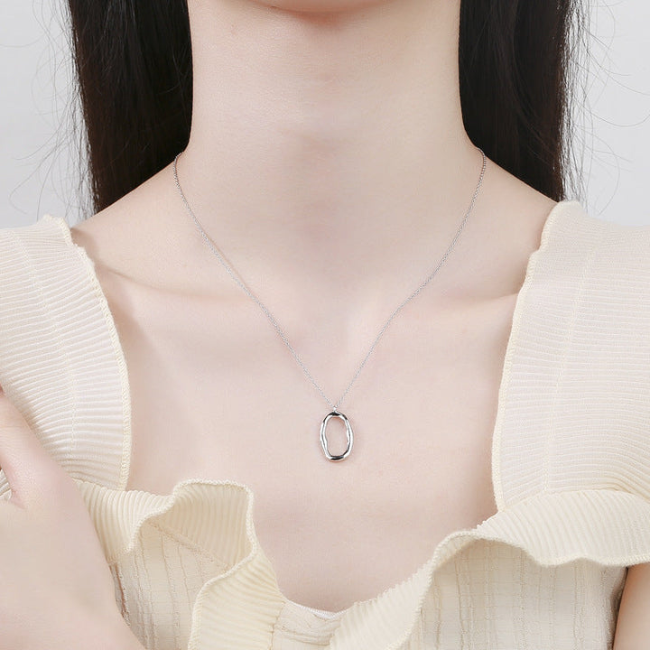 Ladies necklace with modern, organic pendant Nin Boutique