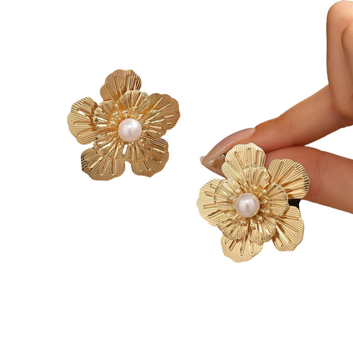 Women's earrings with artistic flower design and pearl accents Nin Boutique