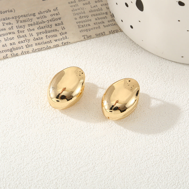 Women's stud earrings in luxurious gold design Nin Boutique