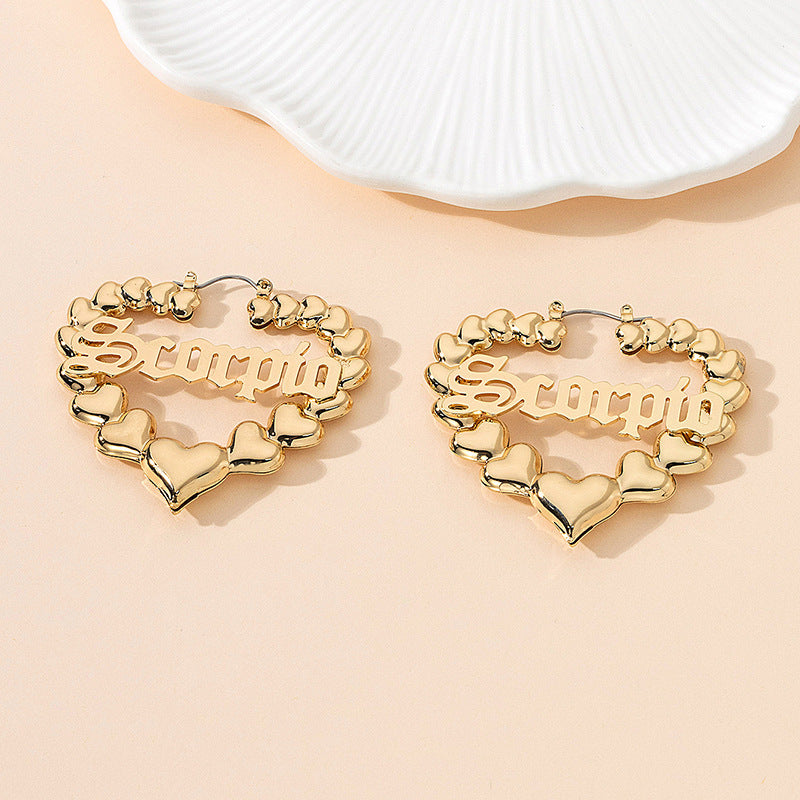 Women’s earrings with unique heart design and astrological element Nin Boutique