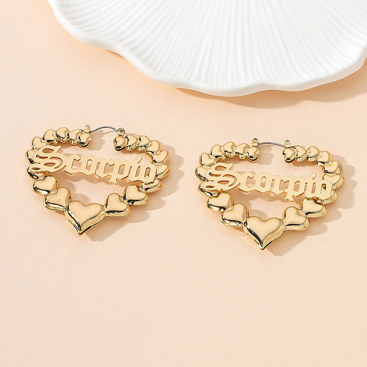 Women’s earrings with unique heart design and astrological element Nin Boutique