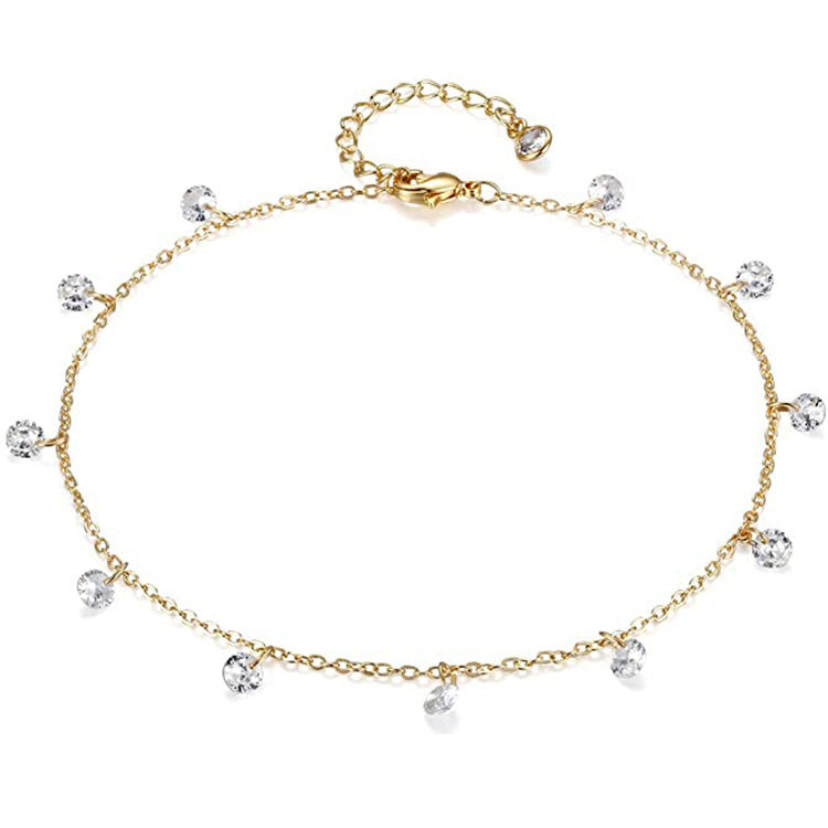 Ladies ankle bracelet with sparkling crystal pendants and delicate gold design Nin Boutique