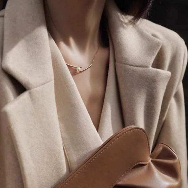 Women’s necklace with stylish minimalist design and elegant pearl Nin Boutique