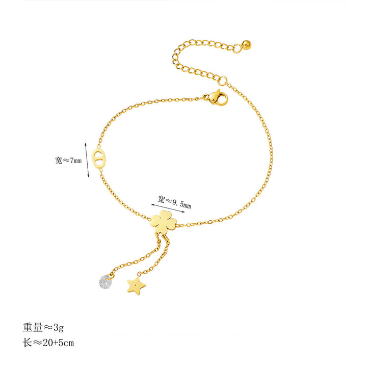 Women's ankle bracelet with delicate lucky flower design and sparkling pendant Nin Boutique