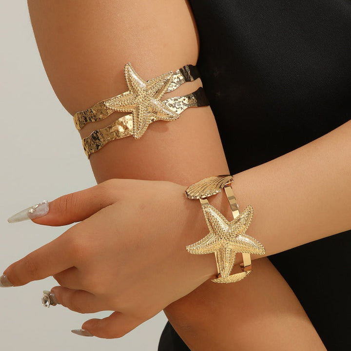 Women’s bracelet with intricate shell and starfish design Nin Boutique