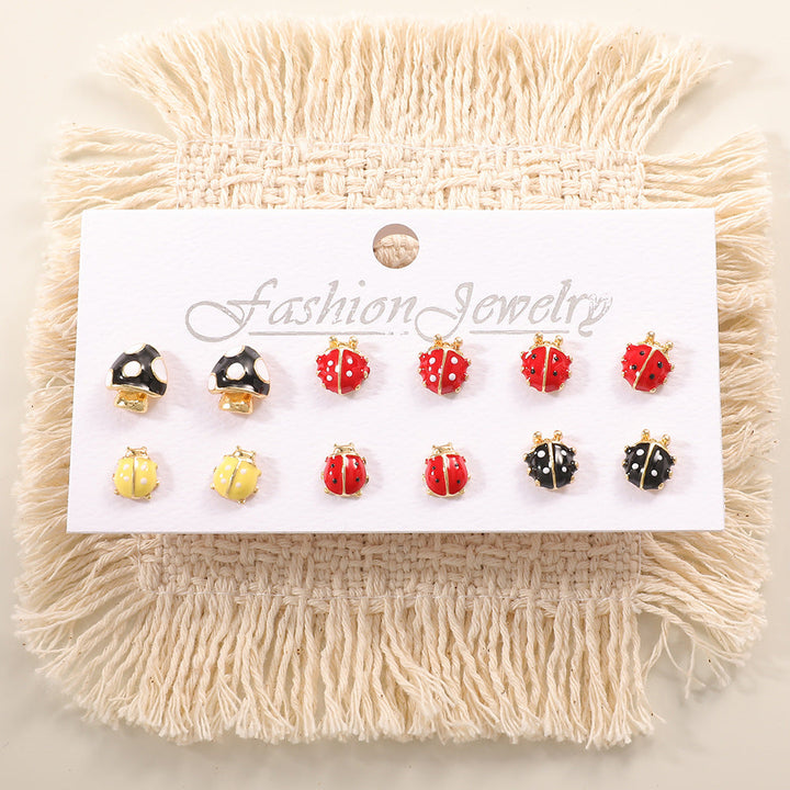 Ladies earring set with playful animal and mushroom design Nin Boutique