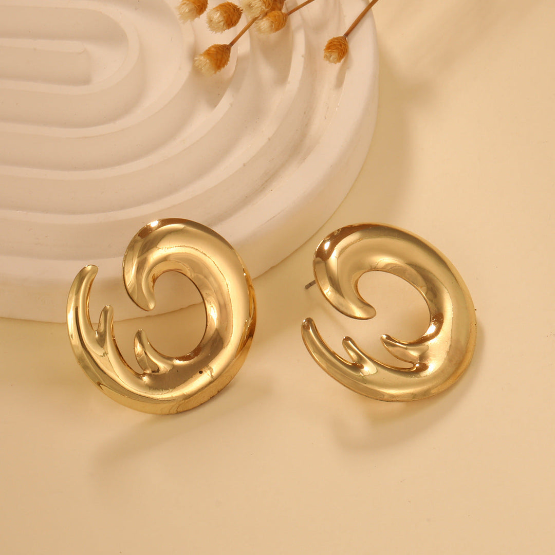 Ladies earrings in elegant wave pattern Nin Boutique