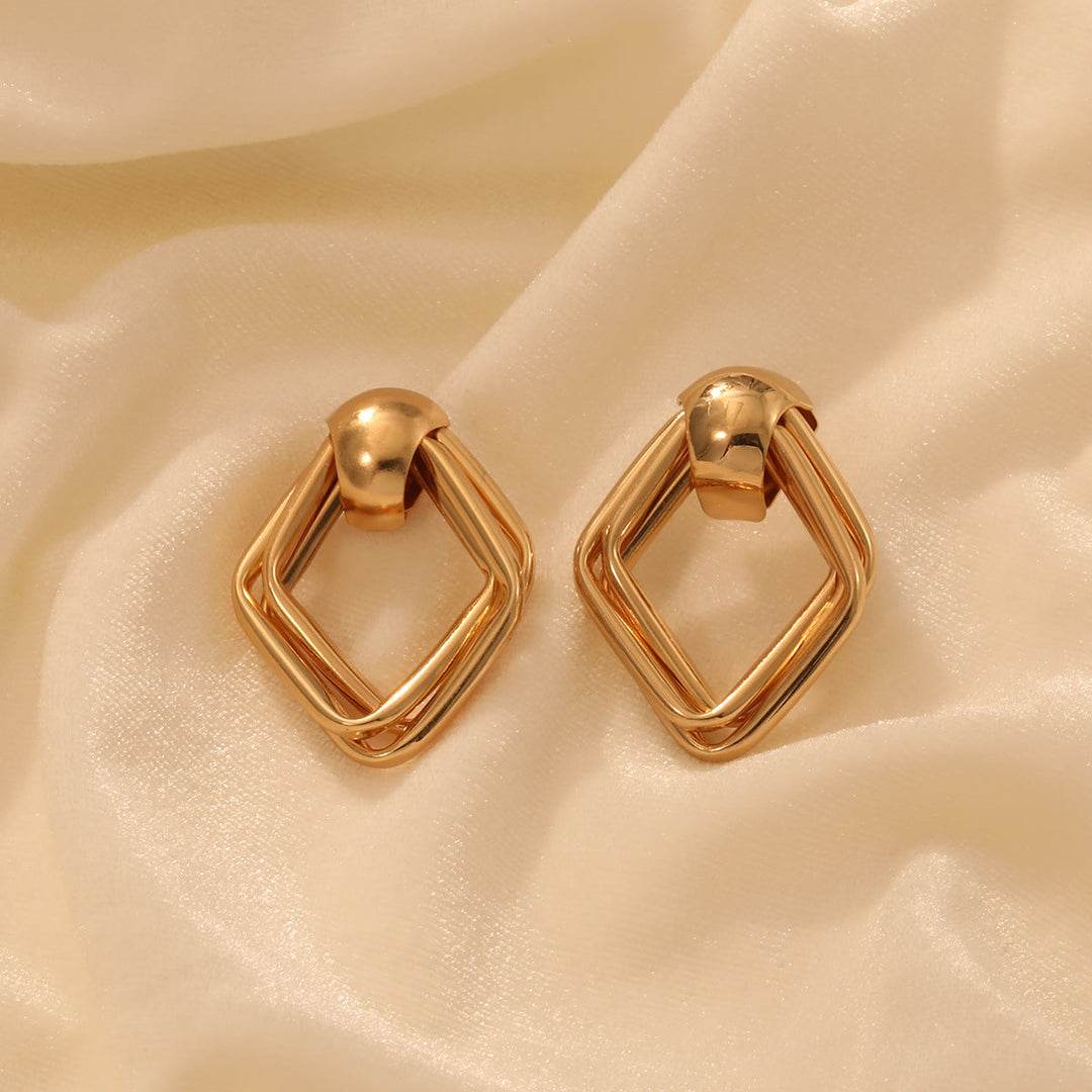 Women’s earrings in artistic, layered design Nin Boutique