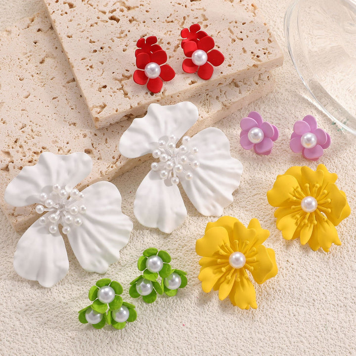 Ladies earrings with playful floral motif and pearl accent Nin Boutique