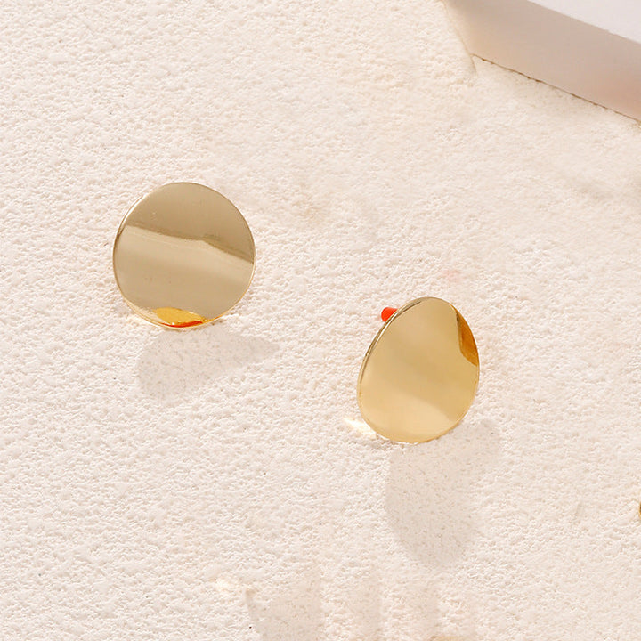 Ladies earrings in artistic face design Nin Boutique